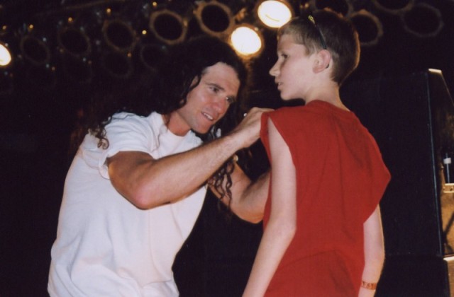 Derrick autographing Todd's shirt